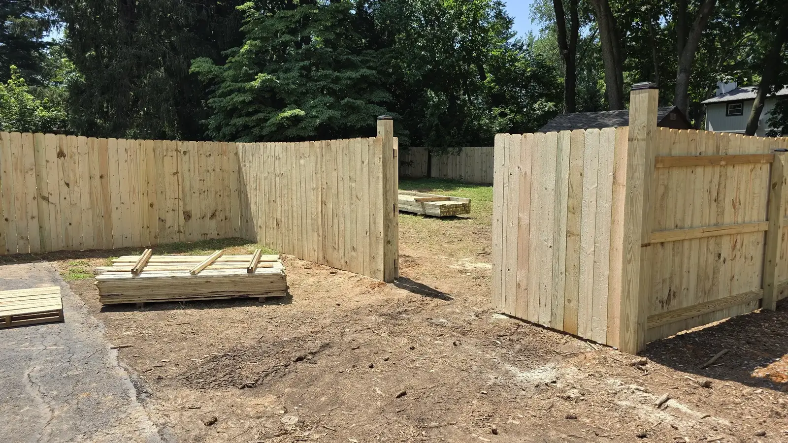 Wood privacy fence installation in progress by Darling Builders in Maryland